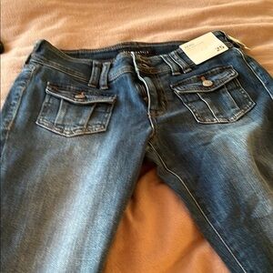 Blue Boot Cut Jeans with Geometric Stitching